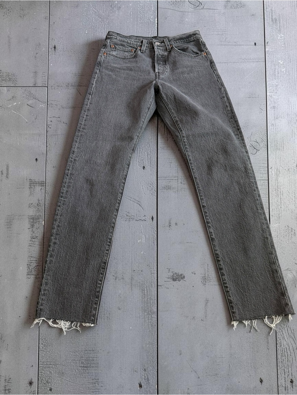 Levi's Women's Straight Leg Jeans 501 in Washed Gray with Frayed Hem